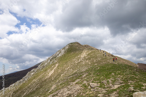 hikers reach the top of Monte Alpi. Monte Santa Croce, Pizzo Falcone, Lucan Apennines, Basilicata, Italy