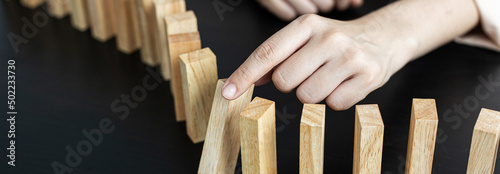 Strategies and risks of wooden games, .Close-up of business people gambling with investment risk, Business people play wooden games to simulate planning and strategy for managing business risk..