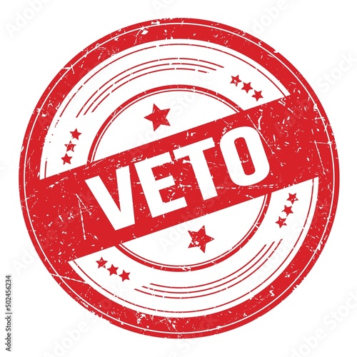 VETO text on red round grungy stamp.