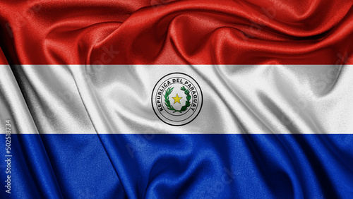 Close up realistic texture fabric textile silk satin flag of Paraguay waving fluttering background. National symbol of the country. 14th of May, Happy Day concept