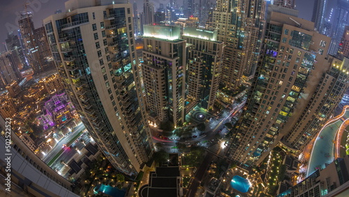 Skyscrapers skyline in Dubai Downtown in the evening aerial timelapse.
