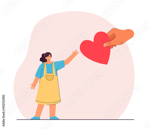 Huge hand giving heart to girl in blue T-shirt and yellow dress. People striving for peace, supporting each other flat vector illustration. Love concept for banner, website design or landing web page