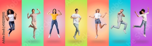 Excited millennials jumping in the air on studio backgrounds
