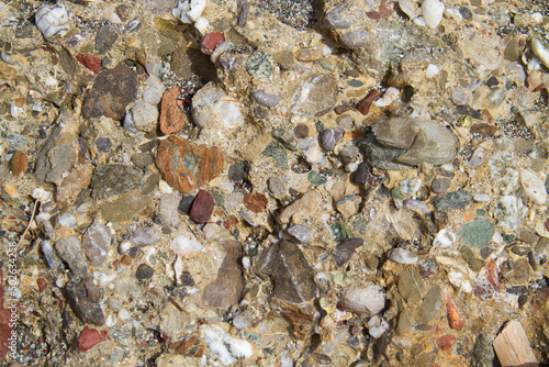 Close-up of Agia Galini conglomerate; clastic sediment, clumped together, cemented stones 