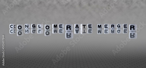 conglomerate merger word or concept represented by black and white letter cubes on a grey horizon background stretching to infinity