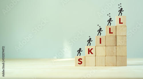 Upskilling and personal development concept. Skill training, education, learning, ability, knowledge and competency for digital transformantion. Upskilling, reskilling, new skills icon on wooden cube