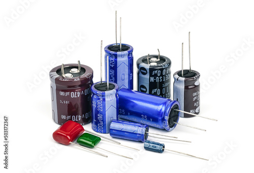 Group of capacitors different sizes isolated on white background. 