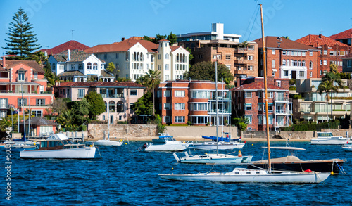 Sydney view from the ocean with boats and homes