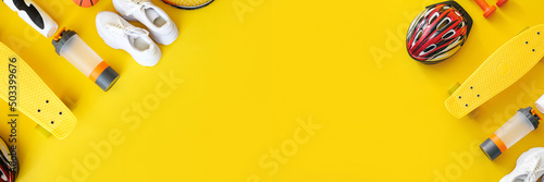 Set of sport equipment on yellow background with space for text, flat lay