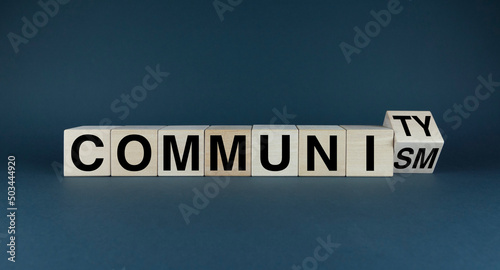 Cubes form the words Community or communism.