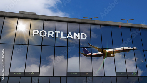 Airplane landing at Portland Oregon, USA airport mirrored in terminal