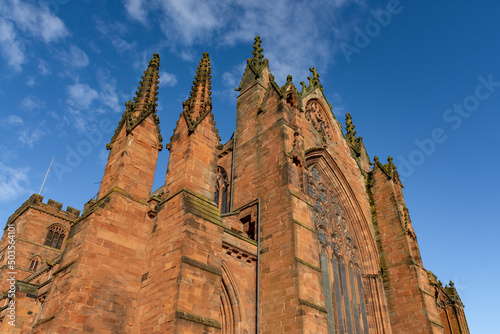 Carlisle Cathedral in the spring sunshine. The second smallest of England's ancient cathedrals it was founded as an Augustinian priory and became a cathedral in 1133. Carlisle, Cumbria, UK.