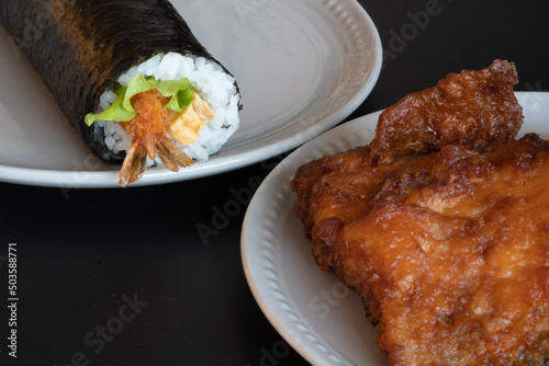 Sushi roll and fish fry