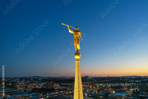  Angel Moroni of Mormon Church against night sky.