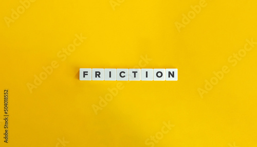 Friction Word and Banner. Letter Tiles on Yellow Background. Minimal Aesthetics.