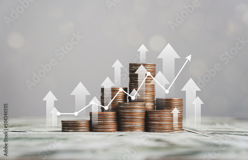 stack of silver coins with trading chart in financial concepts and financial investment business stock growth