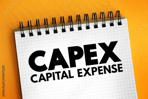 CAPEX Capital Expense - money an organization or corporate entity spends to buy, maintain, or improve its fixed assets, acronym text on notepad