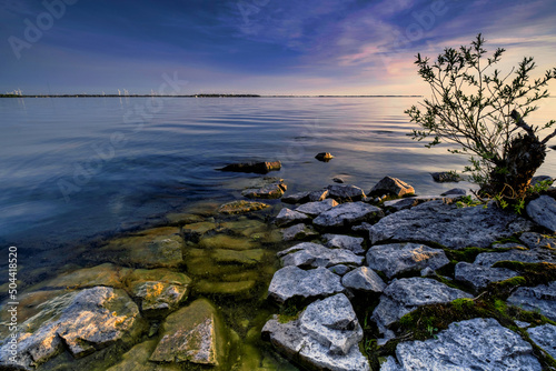 Stunning wide angle landscapes of south easter Ontario Canada featuring Lake Ontario with calm waters and the natural boreal forests of the region. Enjoy parks and scenic hikes.