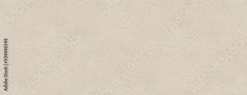 Beige kraft paper texture. Rough surface. Panoramic background. 