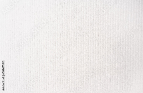 Rough white paper background texture.