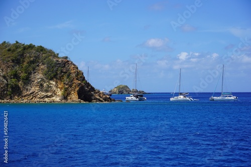 Boats moored at The Caves on Norman Island British Virgin Islands