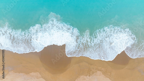 Top view of the Ocean seashore with beautiful color sea waves. Wonderful seascape with copy space background