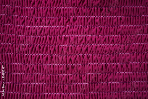 Pink fabric elastic band stitched with thread, tight elastic background