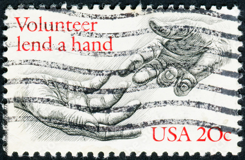 USA - CIRCA 1983: Postage stamp printed in the United States of America shows two hands, Voluntarism