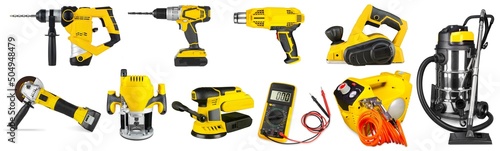 Set collection of yellow electric power hand diy tools like cordless drill angle grinder router heat gun sander and workshop vacuum cleaner isolated white background. industry concstruction concept