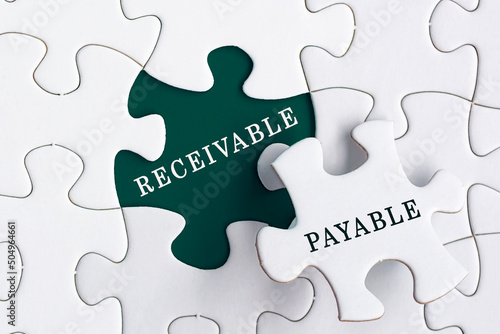 Receivable and payable text on Jigsaw Puzzle. Accounting concept
