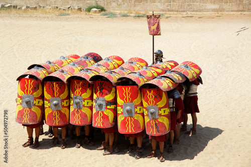 Actors playing roman legionaries soldiers in the tortoise tactic, Jerash, Jordan