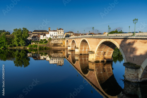 view of the Dordogne River and old stone bridge leading to Bergerac