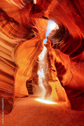 ancient ghost into a shaft of light of the canyon Antelope near Page Arizona. Navajo religion and beauty of nature concept.