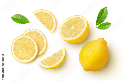 Fresh organic yellow lemon fruit with slice and green leaves isolated on white background . Top view. Flat lay.