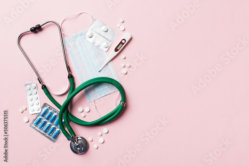 Medical background. Many different various medicine tablets or pills on the table with stethoscope. Close up. Healthcare pharmacy and medicine concept