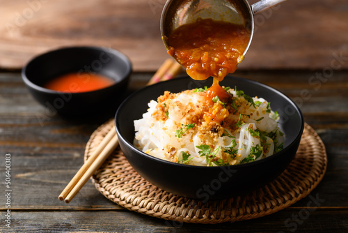 Rice noodle mixed with spicy tomatoes sauce, Tai Yai food in Northern of Thailand