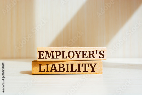 Wooden blocks with words 'EMPLOYER'S LIABILITY'. Business concept