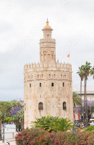 The tourist Torre del Oro in Seville, next to the Guadalquivir river, Andalusia (Spain)