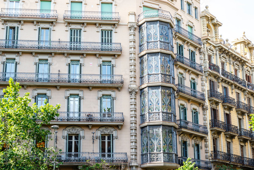 Facade of old Modernist apartment buildings in el Eixample, Barcelona, Catalonia, Spain, Europe