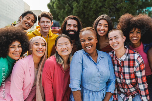 Multiethnic diverse group of people having fun outdoor - Diversity lifestyle concept