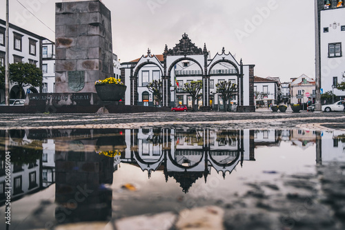 Portas da Cidade reflection after the rain, in Ponta Delgada