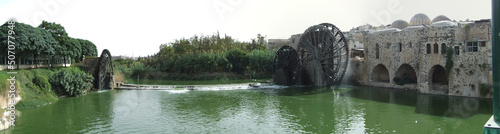 Hama, Syria. 13-10-2010. Panorama photo. The waterwheels or norias of Hama. Before the war.