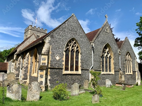 View of the Parish church of St. Andrew and medieval cemetery. Selective focus. Sonning, England, Berkshire, United Kingdom