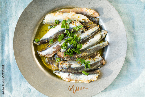 Traditional Spanish pintxos of Cantabrian anchovies in olive oil