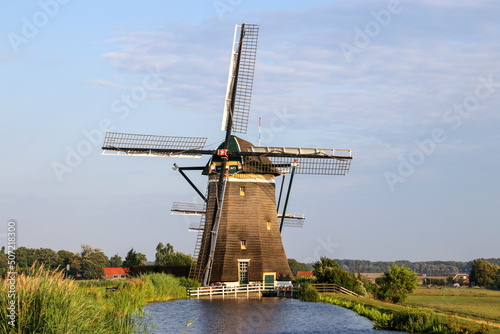 Three windmills on a row to keep the Driemanpolder dry in Stompwijk,