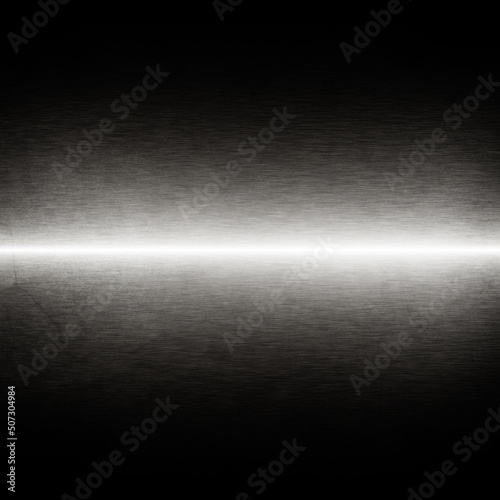black background shiny metal texture white beam of light
