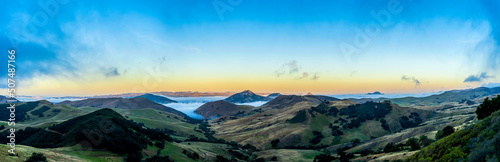 Panorama of Mountains, valley, fog, clouds