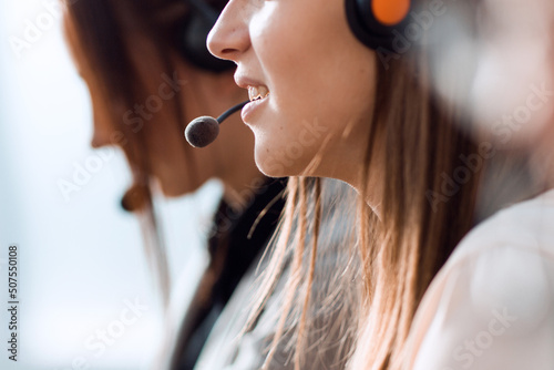 close up. the female operator communicates with the client