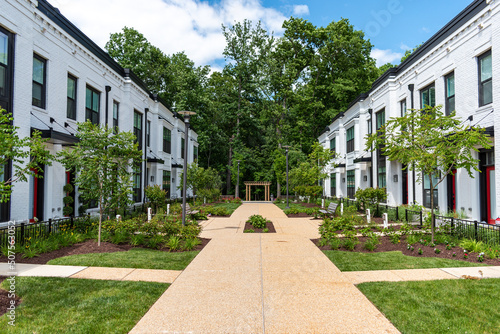 A walkway separates rows of townhouses in Potomac, Montgomery County Maryland.