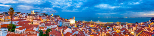 Romantic Destinations. Panorama of The Oldest Alfama District in Lisbon in Portugal While Townscape Picture Made During Golden Hour.